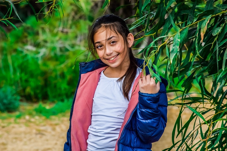Girl wearing blue jacket